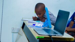 A child at Netisens ICT learning a tech skills during Netisens Summer boot camp